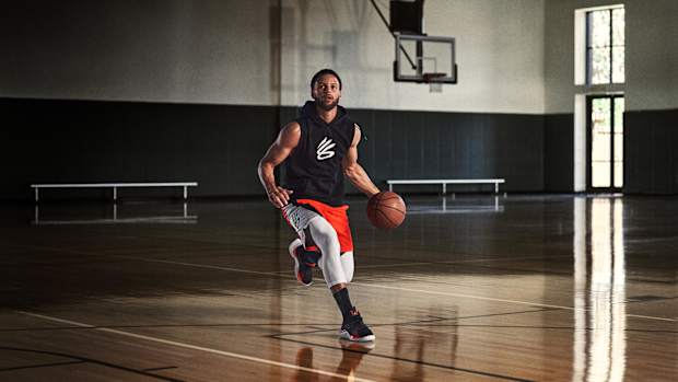 Stephen Curry dribbling the basketball.